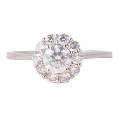 Lot 81 - Luke Stockley - a diamond cluster ring.
