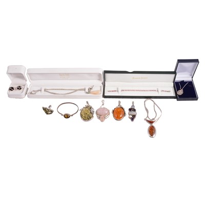 Lot 551 - A collection of reconstructed amber and other quartz white metal jewellery.