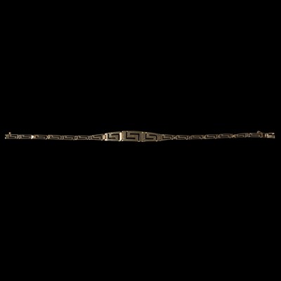 Lot 264 - A yellow metal Greek key bracelet.
