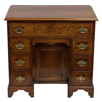 Lot 213 - George III style walnut and figured walnut kneehole dressing table