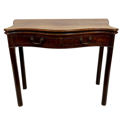 Lot 217 - George III mahogany serpentine tea table