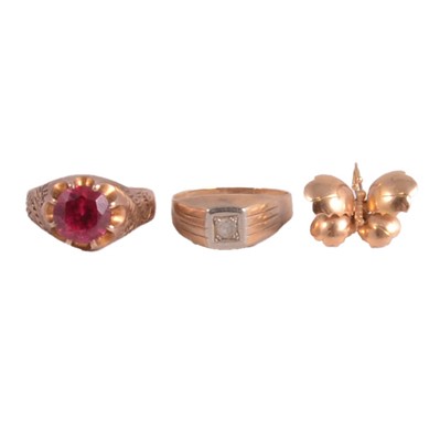 Lot 382 - Two yellow metal rings and a small pin.