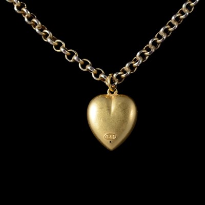 Lot 305 - A yellow metal pendant and chain.