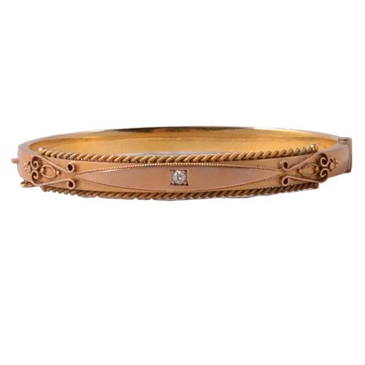 Lot 240 - A Victorian yellow metal half hinged bangle.