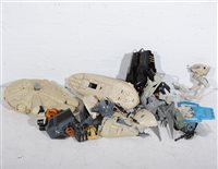 Lot 1252 - Star Wars vehicles and parts; vintage in age,...