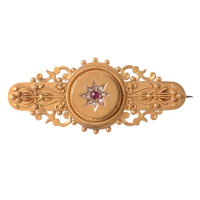 Lot 228 - A ruby and diamond bar brooch.