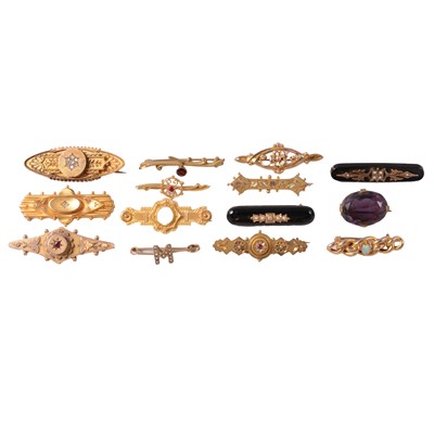 Lot 231 - Fourteen Victorian and Edwardian bar brooches.