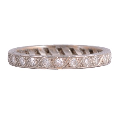 Lot 71 - A diamond full eternity ring.
