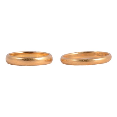Lot 117 - Two 22 carat gold wedding bands.