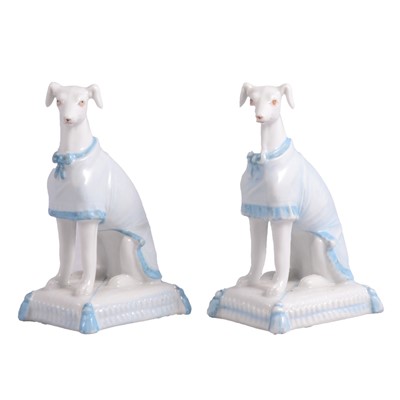 Lot 37 - Two French porcelain models of seated greyhounds