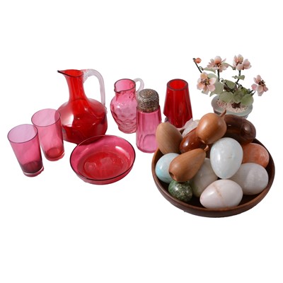 Lot 83 - Small quantity of cranberry glass, and a collection of turned wood and stone eggs