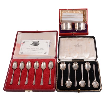 Lot 373 - Two cased sets of silver teaspoons, pair of silver napkin rings, and short silver chain