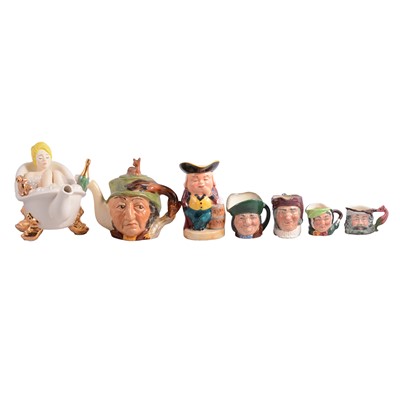 Lot 72 - Novelty teapots and characters jugs, hardstone carved figure