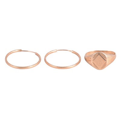 Lot 125 - A 9 carat yellow gold signet ring, and a pair of yellow metal ear hoops.