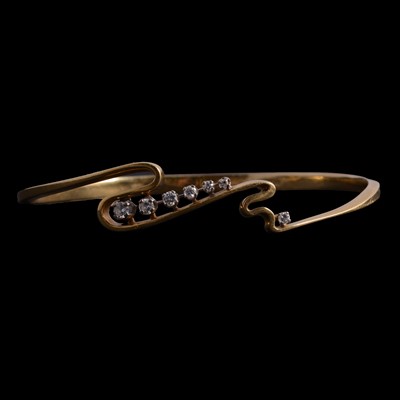Lot 167 - Gillian Packard – an 18 carat yellow gold and diamond generous size solid bangle.