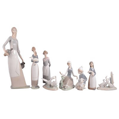 Lot 92 - Five Lladro and two Nao figures.
