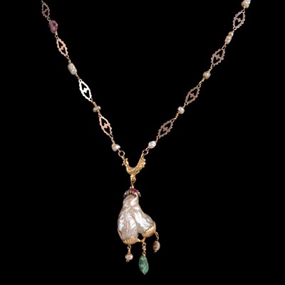 Lot 297 - A baroque pearl pendant and chain.
