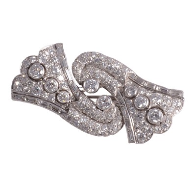Lot 194 - A diamond set duette double clip brooch.