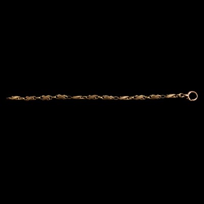 Lot 265 - A yellow metal bracelet.