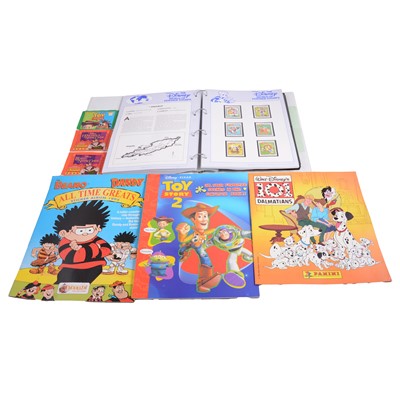 Lot 244 - Quantity of modern Disney-related coin and medal sets, stickers, and similar