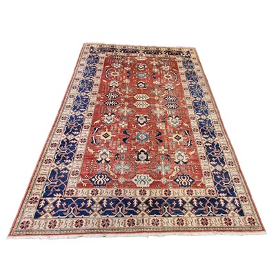 Lot 559 - Turkish carpet, patterned red field 218cmx295cm.
