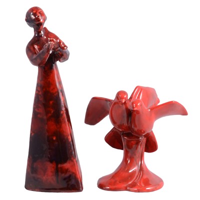 Lot 13 - Royal Doulton flambe model, Lady with dove and another flambe model of a pair of doves