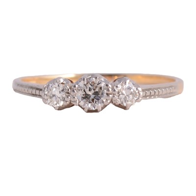 Lot 53 - A diamond three stone ring.