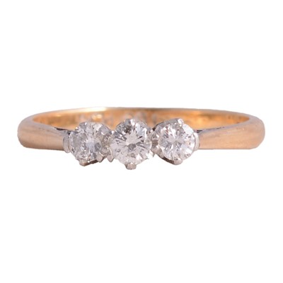 Lot 54 - A diamond three stone ring.