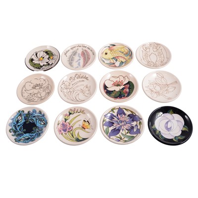 Lot 140 - Moorcroft Pottery, a collection of twelve coasters
