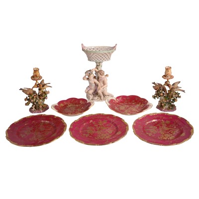 Lot 71 - Continental porcelain figural sweetmeat basket, two bocage candlesticks, and tableware