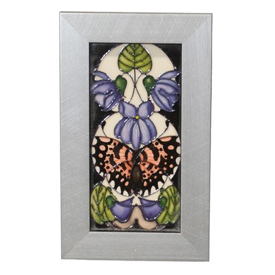 Lot 157 - Moorcroft Pottery, a small framed ceramic plaque with butterfly design