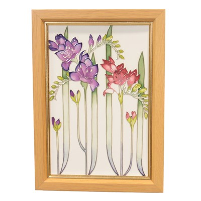 Lot 144 - Moorcroft Pottery, a large ceramic floral design plaque