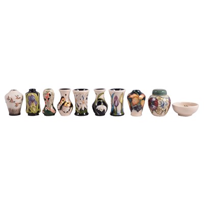 Lot 169 - Moorcroft Pottery, a collection of ten modern miniature vessels