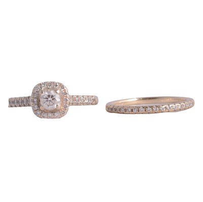 Lot 67 - A diamond cluster ring, and a diamond half hoop ring.