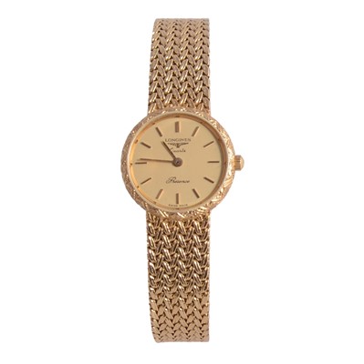 Lot 455 - Longines - a lady's Presence Quartz 9 carat yellow gold bracelet wristwatch.
