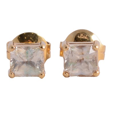 Lot 175 - A pair of solitaire earrings in Sri Lankan box.