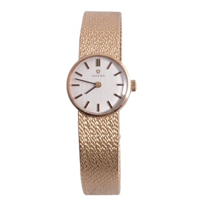Lot 460 - Omega - a lady's 9 carat yellow gold bracelet wristwatch.