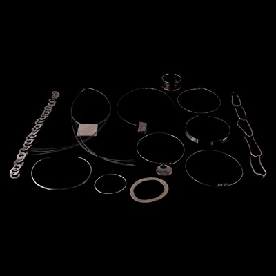 Lot 377 - A modern silver necklace and other white metal and steel necklaces and bracelets.