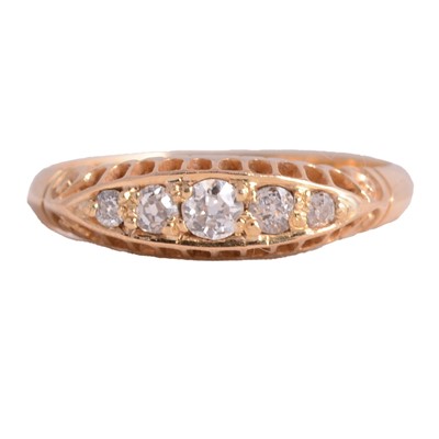 Lot 58 - An Edwardian diamond five stone ring.