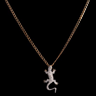 Lot 339 - Three gemset pendants on gold chains.