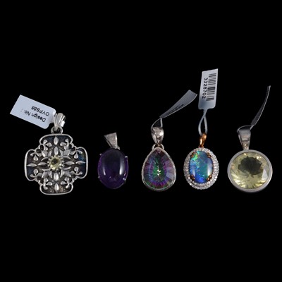 Lot 492 - Twenty-eight large pendants in silver and white metal mounts, mostly gemset.