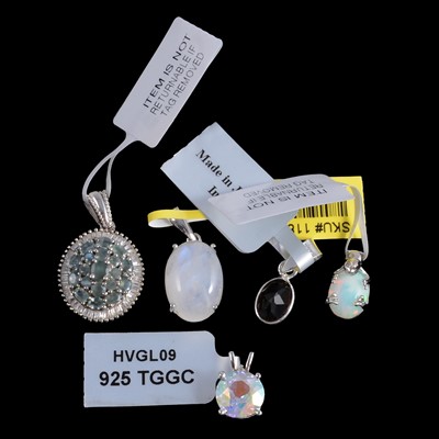 Lot 491 - Twenty-six small pendants in silver and white metal mounts, mostly gemset.