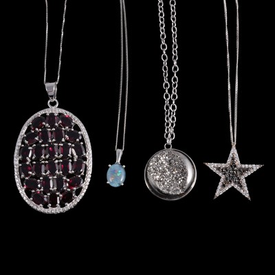Lot 403 - Twenty silver pendants on chains, some gemset, new and unworn.