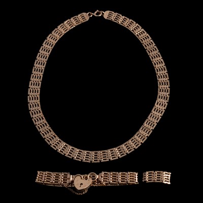Lot 296 - A 9 carat yellow gold matching gate link design necklace and bracelet.