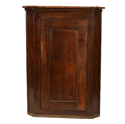 Lot 384 - George III oak and elm hanging corner cupboard