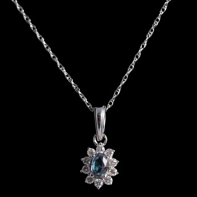 Lot 355 - An alexandrite and diamond pendant and chain.