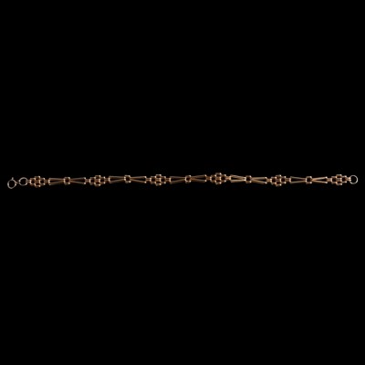 Lot 267 - A 9 carat yellow gold fancy link bracelet.