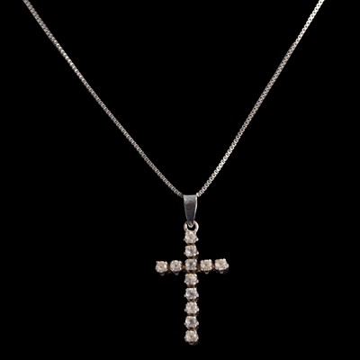 Lot 316 - A synthetic white stone (not diamond) cross on a chain.