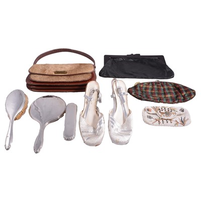 Lot 586 - A lion skin handbag, evening bags, purses, dance shoes, and silver-backed dressing table set.