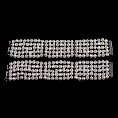 Lot 270 - A pair of five row cultured pearl bracelets.
